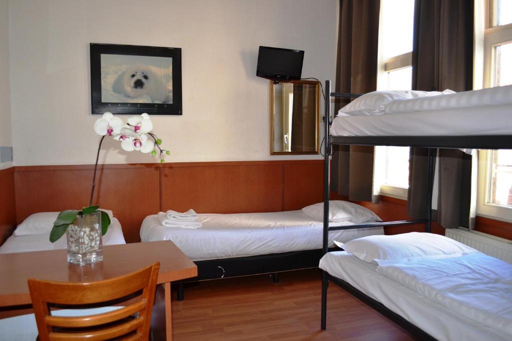 Quadruple Room with Shared Bathroom